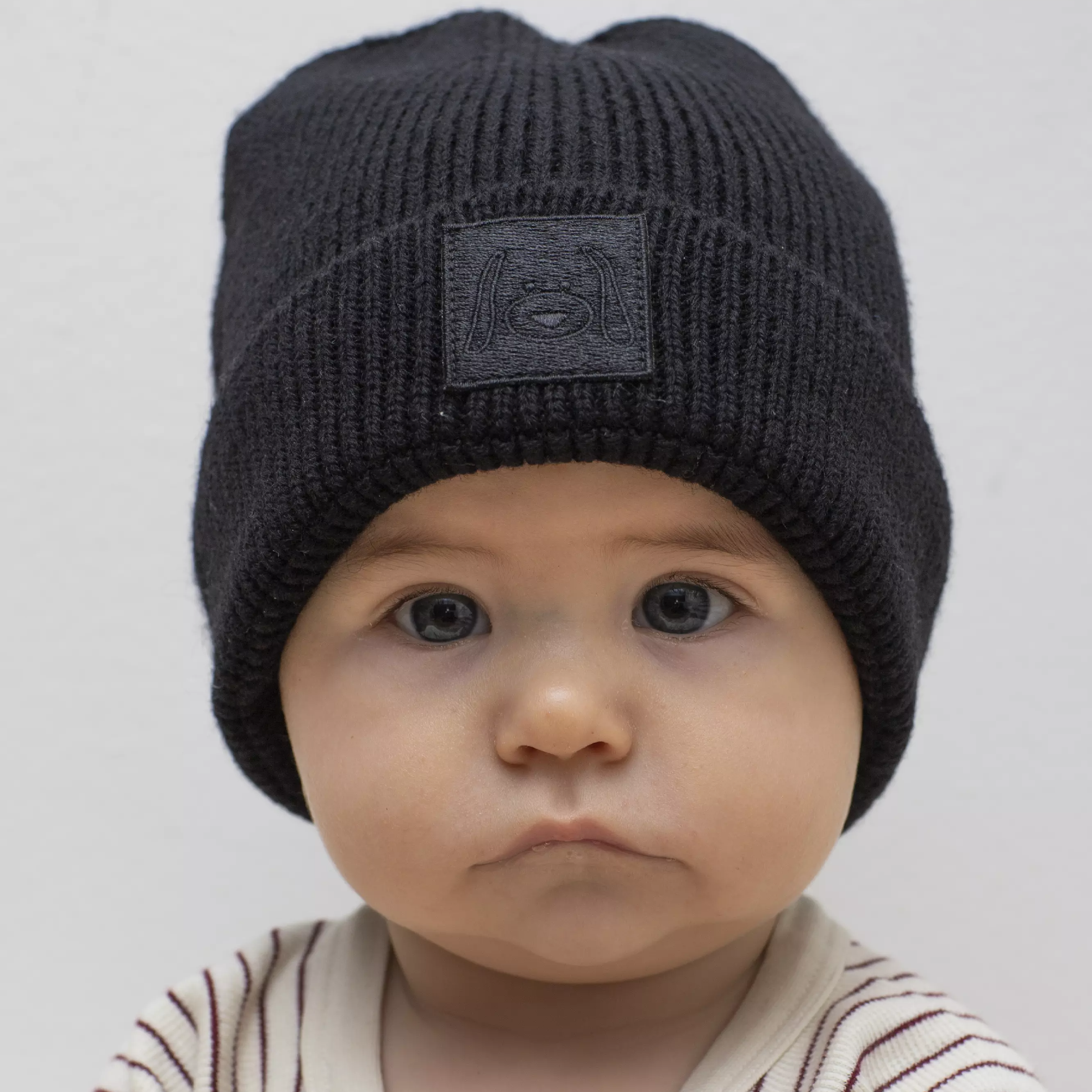 Knitted beanie patched Black