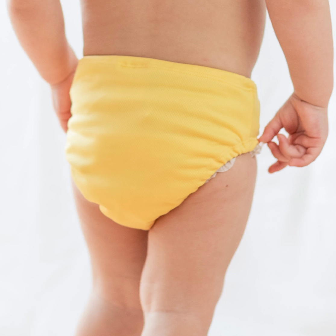 UV-Baby-Badehose Gelb